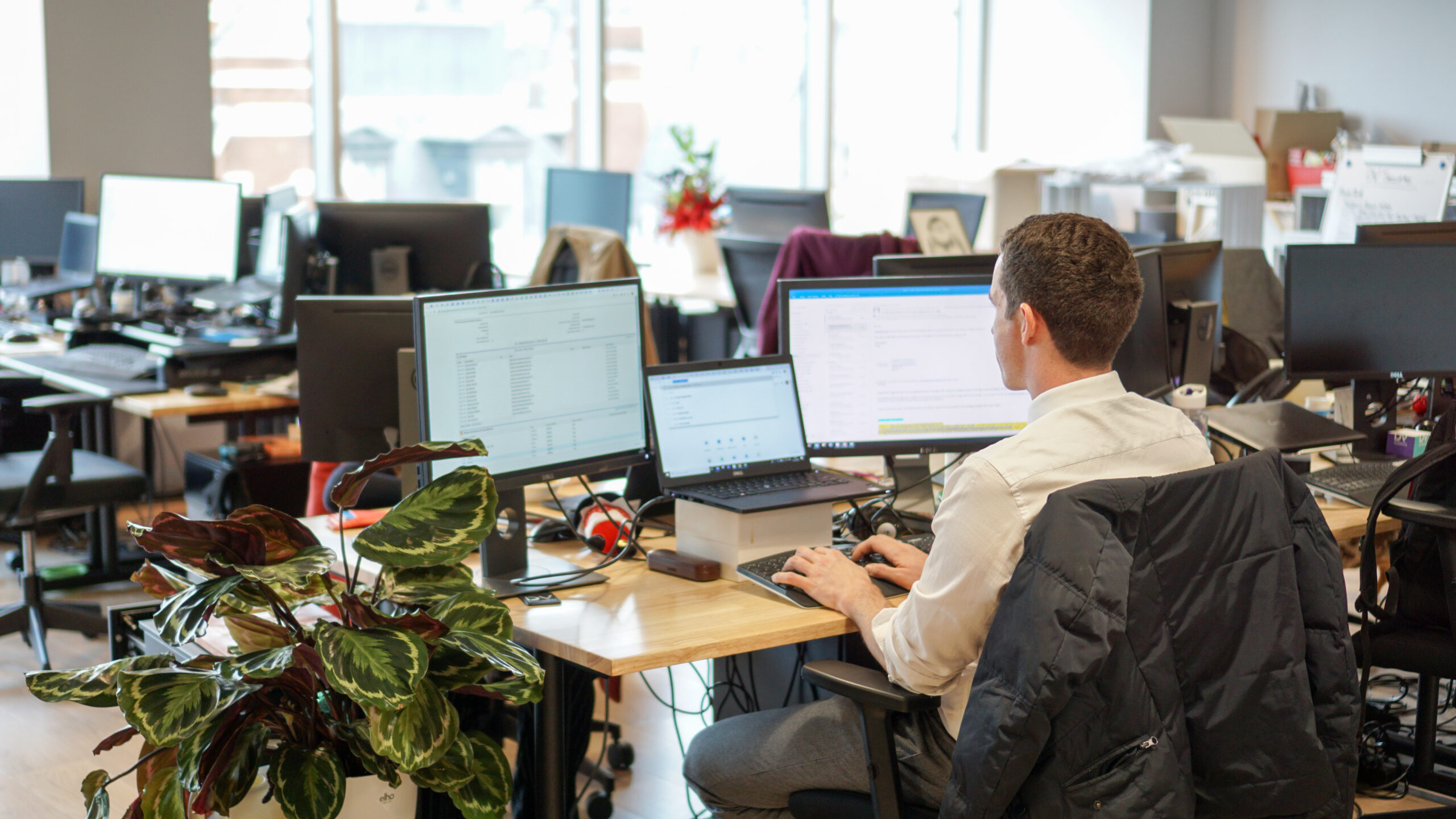 Landlord reviewing office fit out plans with building services consultant